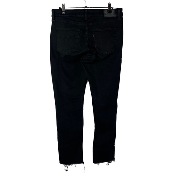 Levi's Classic Mid Rise Skinny Raw Hem Black Jeans 12 - Picture 2 of 4